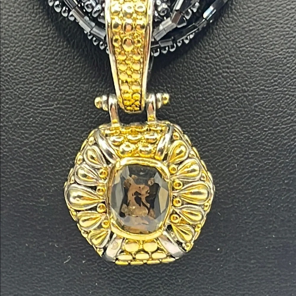 Elegant Black Beaded Necklace with Gold and Silver tone Pendant with Quartz